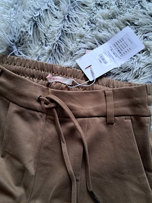 Nowe piękne karmelowe spodnie Xs/34 only