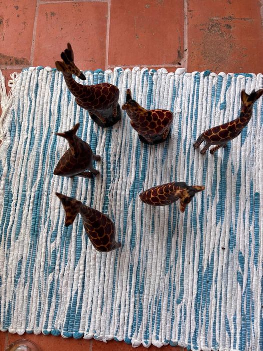 esculturas animais em madeira