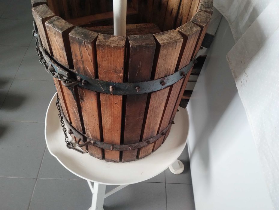 Prensa de cera e uvas