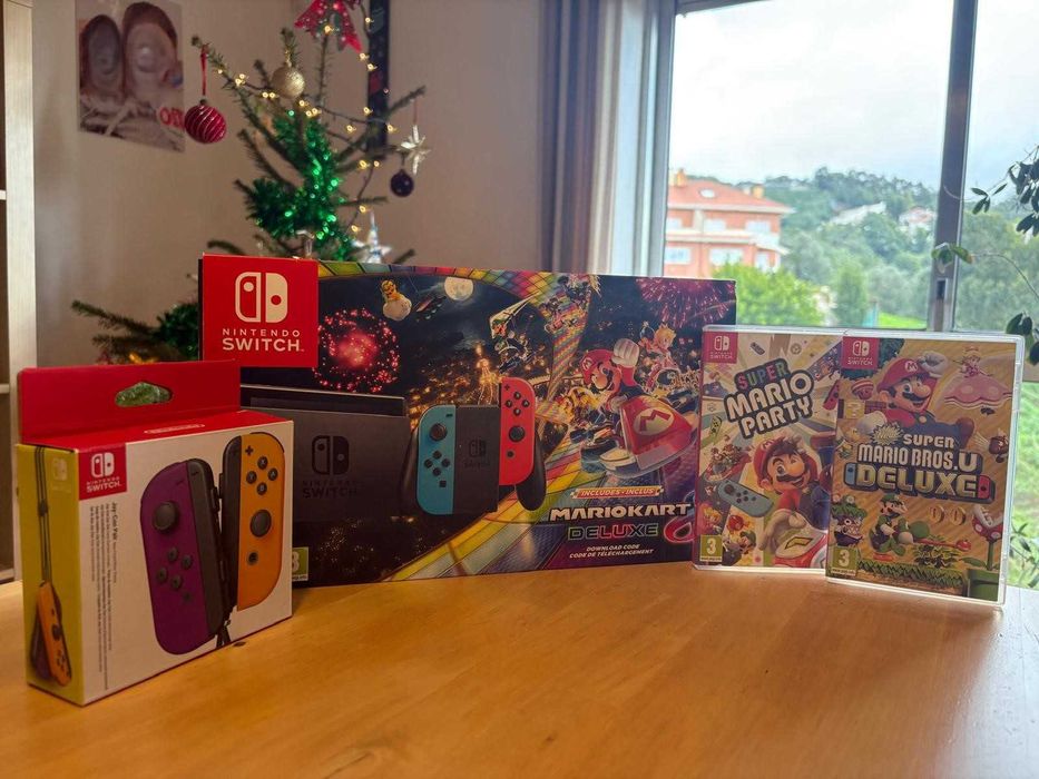 Nintendo Switch com 4 Comandos e 3 Jogos Super Mario