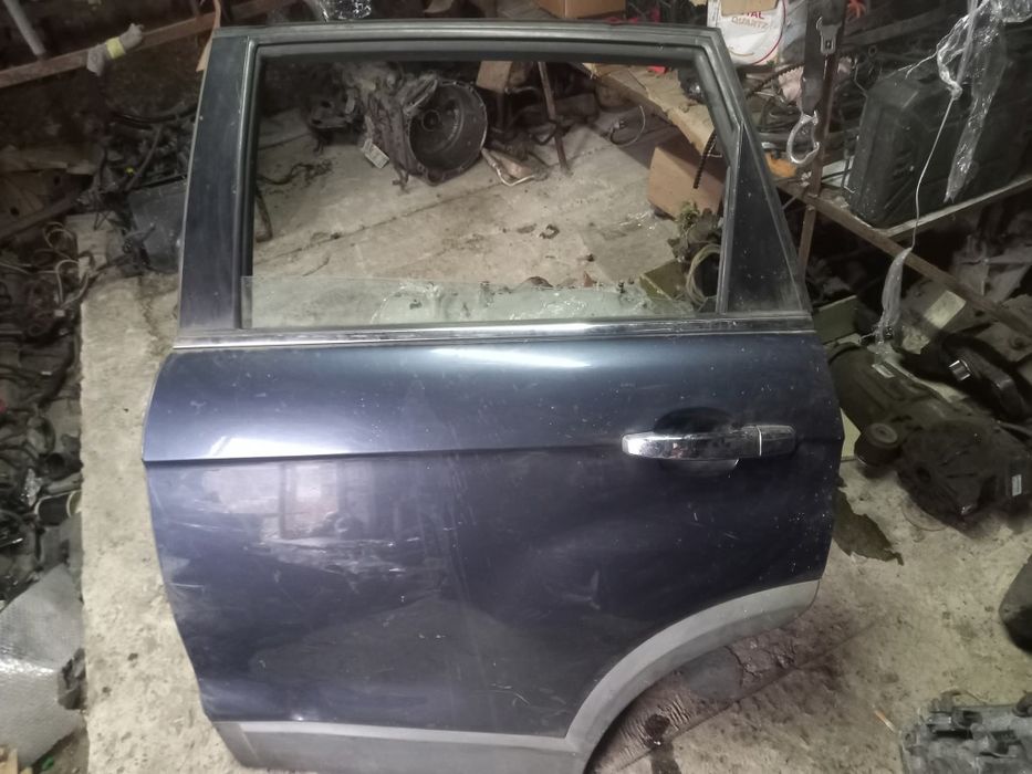 Двері Шевроле каптіва с100