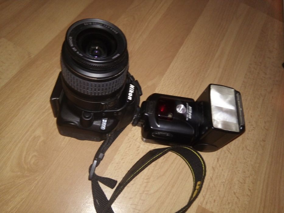 Nikon D3100 com zoom é flash
