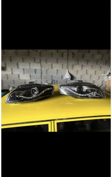 Óticas Audi A4 B7 LED Angel Eyes Pretas (Par)