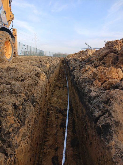 Koparko-ładowarka Usługi niwelacja terenu korytowanie wykopy przyłącza