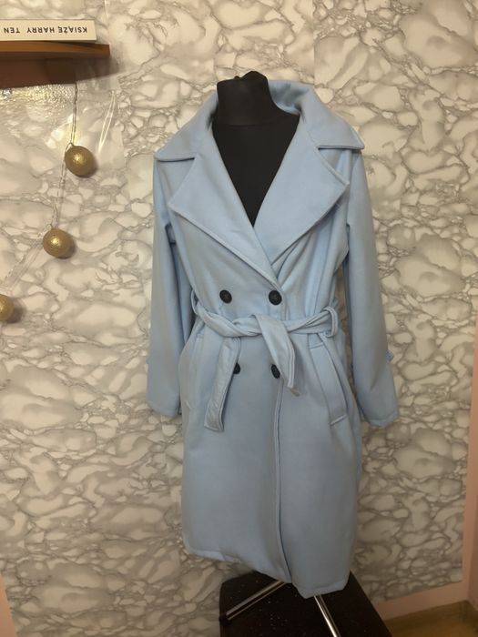 Niebieski płaszczyk biust 110