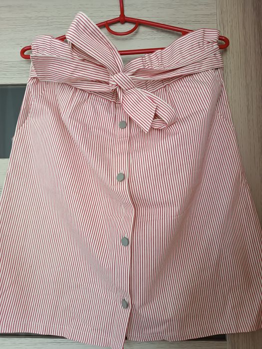 Спідничка нова в дрібну смужку