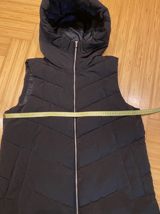 Жіноча жилетка