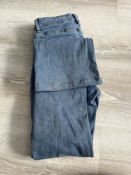 Джинси в кльош жіночі