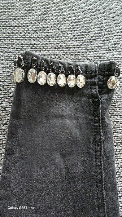 Damskie jeansy skinny z kryształami 38