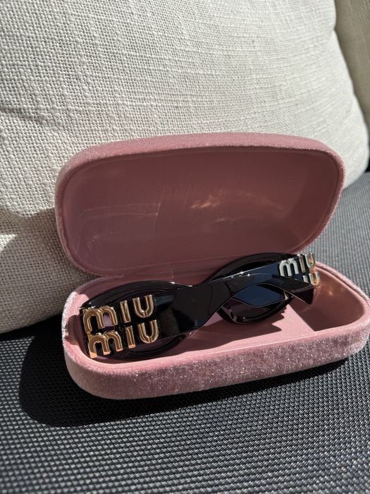 Жіночі окуляри Miu Miu