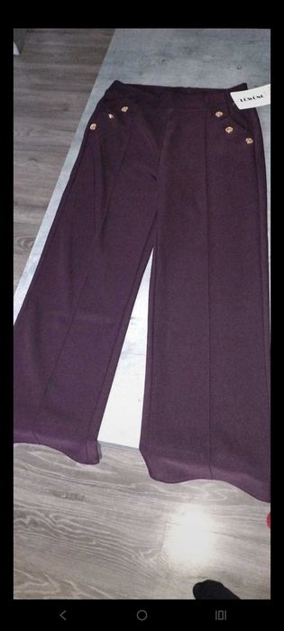 Spodnie damskie szerokie dołem