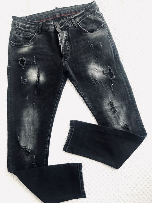 Spodnie jeansowe Dsquared2 dziury przecierane