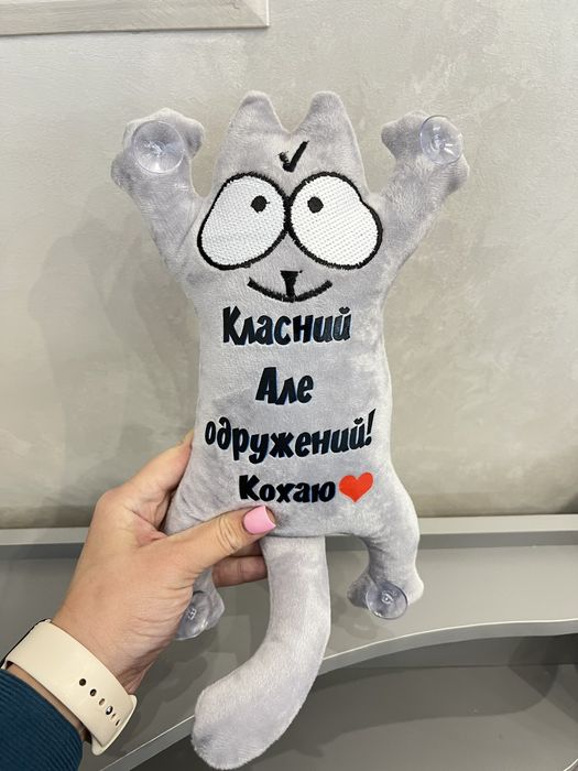 Котик іграшка на присосках