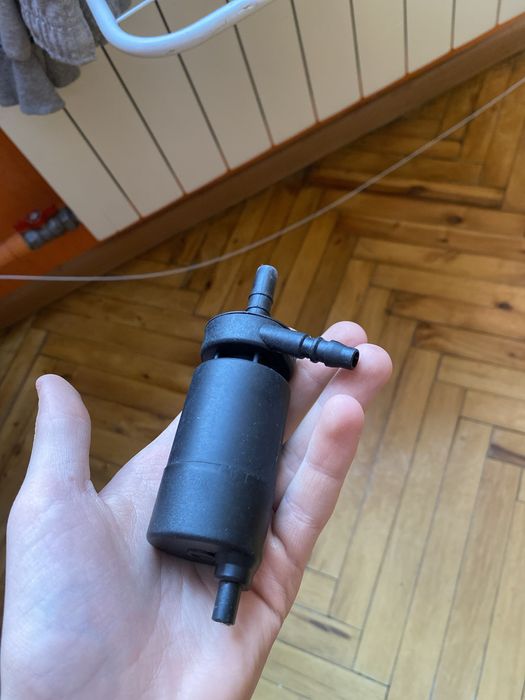 Насос омивача автомобіля