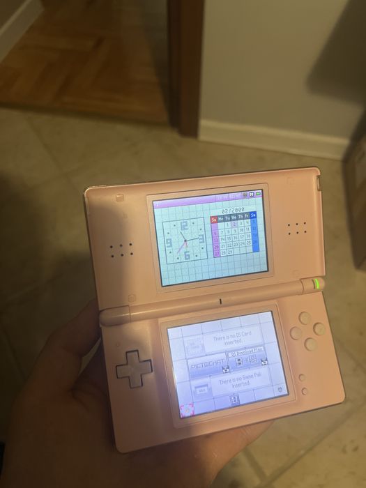 Nintendo DS Lite różowy + 9 gier ładowarka case