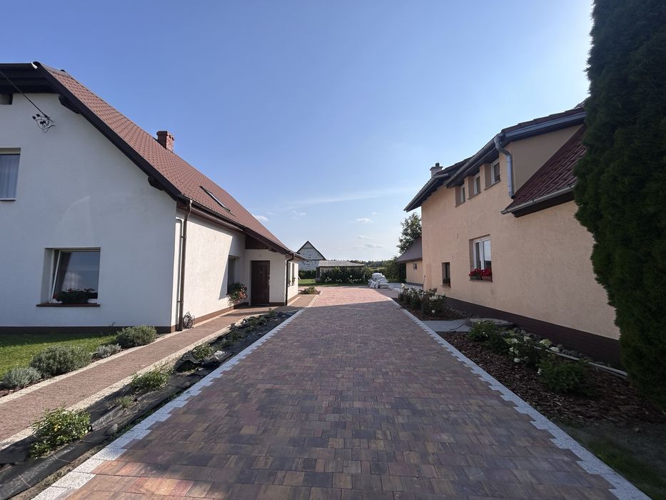 Brukarstwo Budowa ogrodów Trawniki Systemy nawadniające Prace ziemne