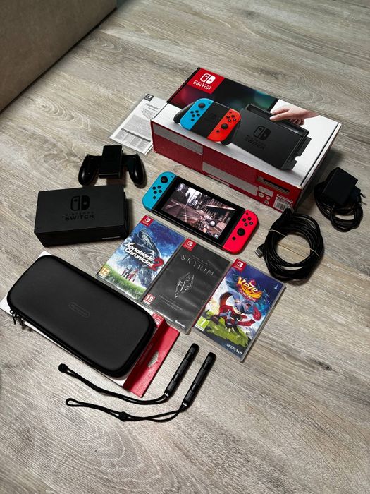 Nintendo Switch V1(XAJ70 под джейл),полный комплект,оригинальный чехол +3 картриджа