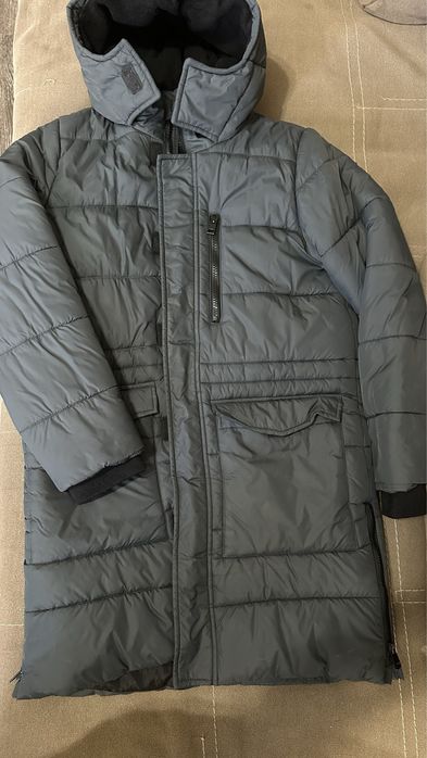 Продам пуховик  зимний на мальчика