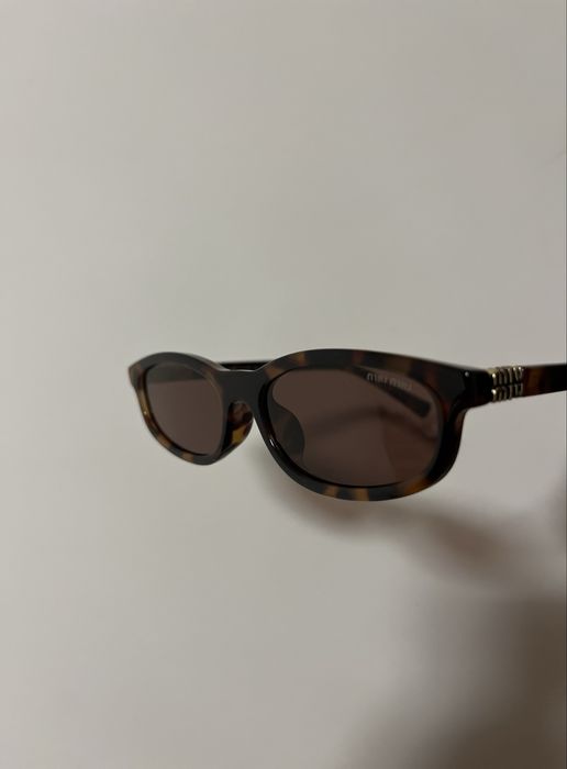 Oculos de sol miumiu