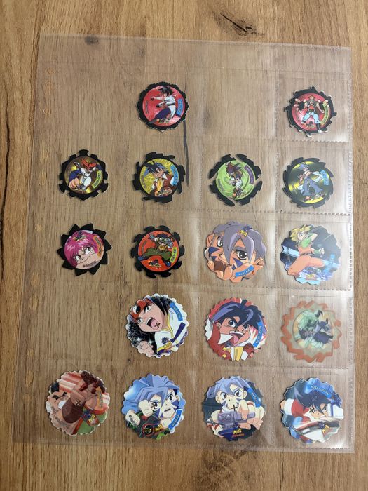 Beyblade spinner tazos 125/172