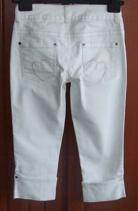 Spodnie jeansy białe bermudy capri mankiety z zamkami 36 Melrose