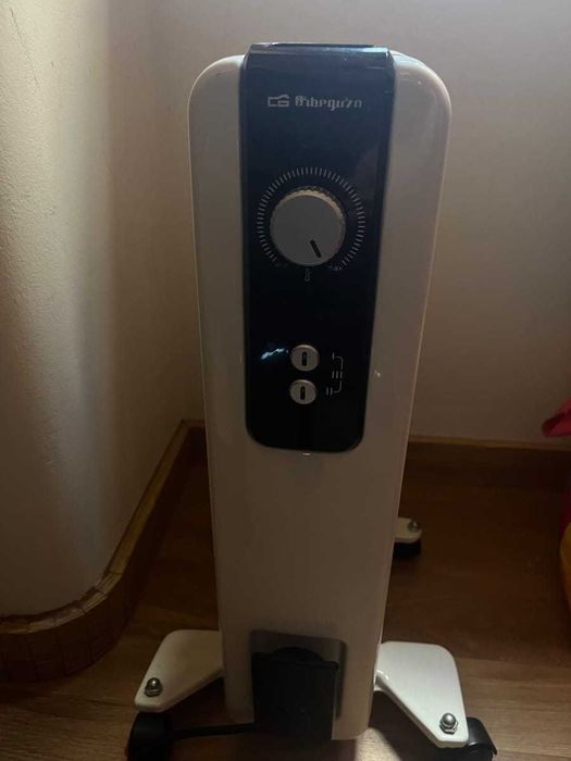 Aquecedor a óleo com rodas, 1500W
