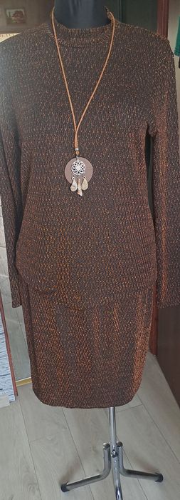 Sliczny czarno złotym komplet bluzka i spódnica