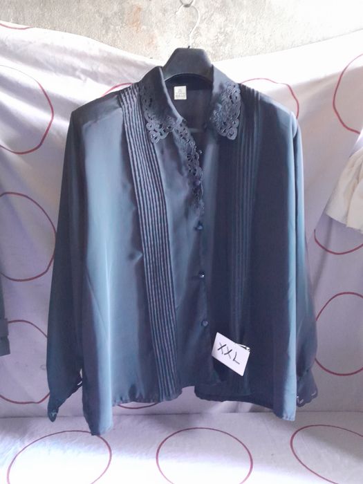 Blusas pretas senhora  50 e xxl