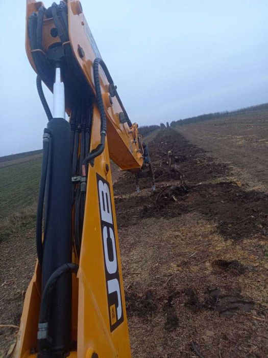 Usługi koparko-ładowarką. Roboty ziemne. Wyrywanie drzew.