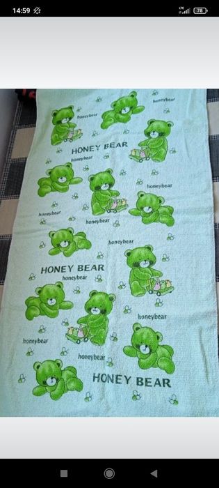 Ręcznik w misie zielony