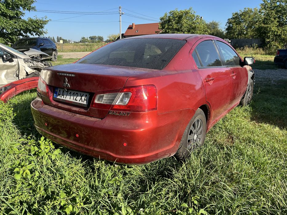 Заднє праве-ліве крило (четверть) Mitsubishi Galant 9