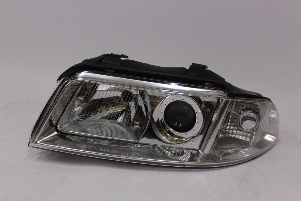 Lampa lewa reflektor przedni przód AUDI A4 B5 99-00 Soczewka NOWA