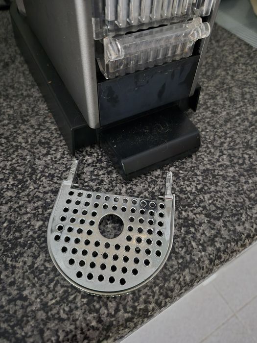 Máquina café Nespresso com defeito