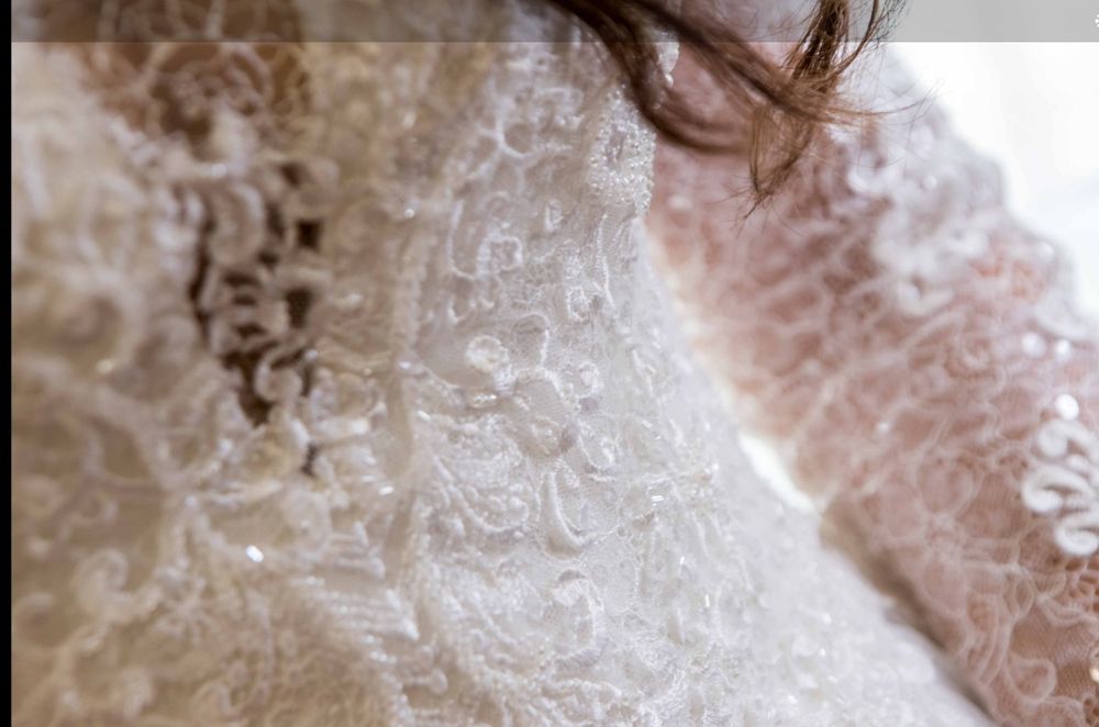 Vestido de noiva AriaBride com véu pronovias
