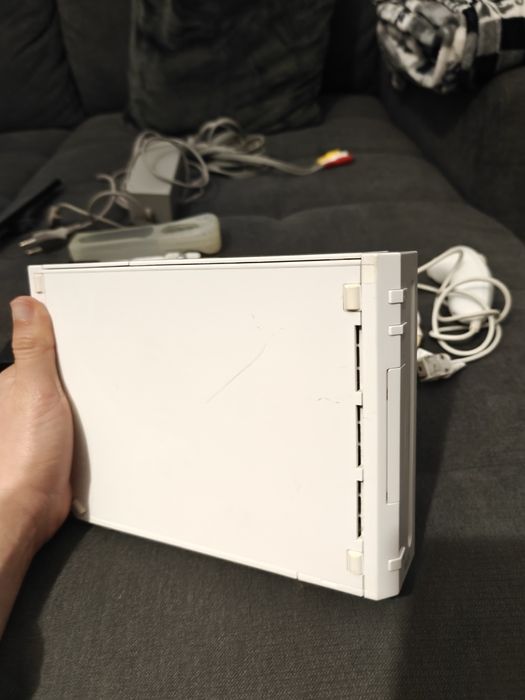 Wii + 3 comandos + 3 nunchuks + 1 comando genérico