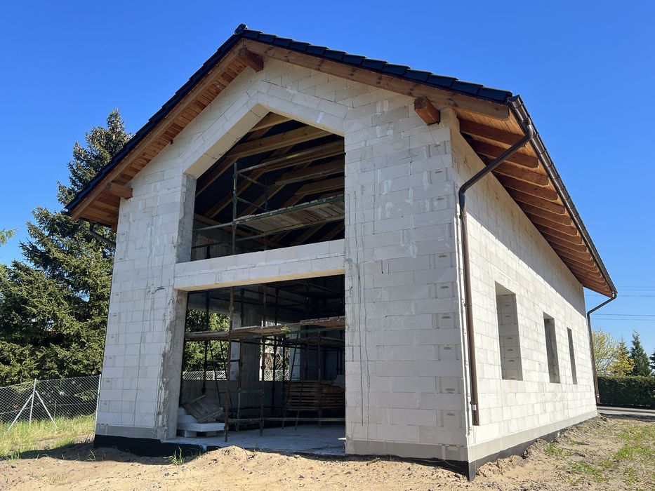 Budowy domów od A do Z . Stany surowe , dachy , elewacje , remonty