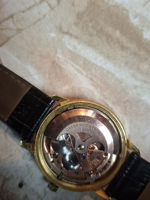 Omega złoto,stal