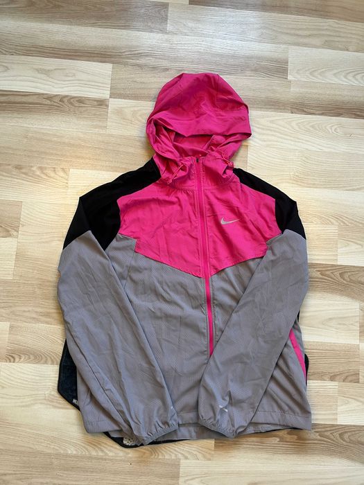 Komplet Nike Running Dri-FIT w rozmiarze L – kurtka + koszulka + spodenki.