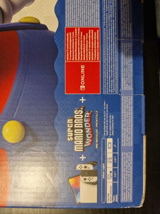 Nintendo Switch OLED + Super Mario Bros. Wonder + 12 Months of Online64738674666371122