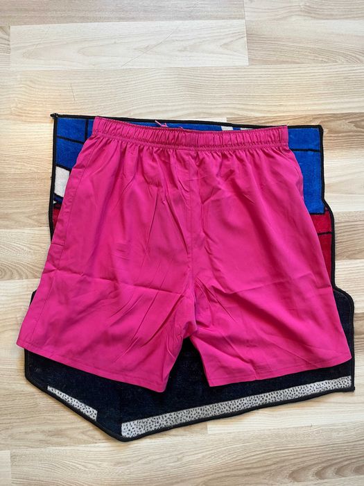 Komplet Nike Running Dri-FIT w rozmiarze L – kurtka + koszulka + spodenki.