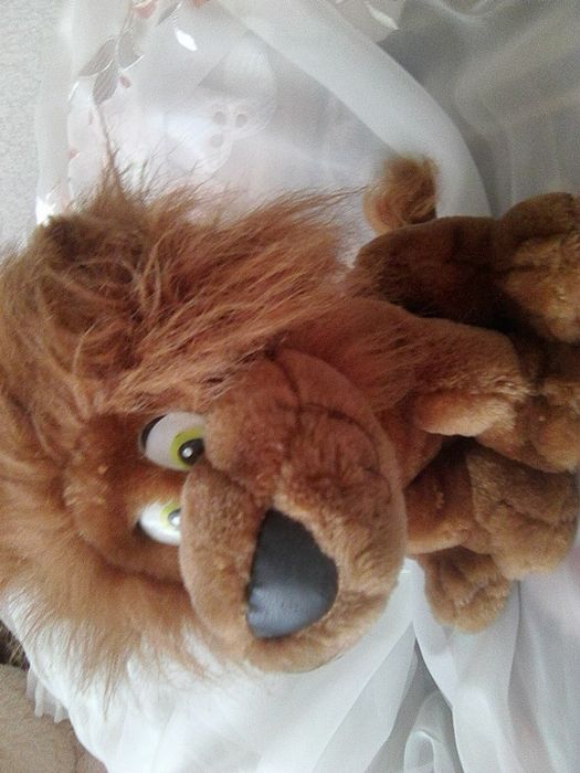 Мягкая игрушка лев.