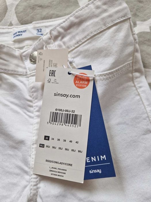 Spodnie białe Sinsay rozm 32