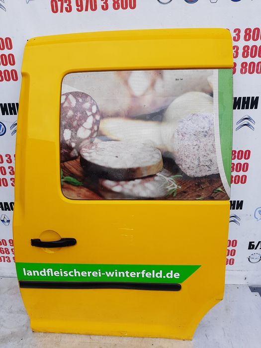 Дверка бокова ліва WV Caddy зі склом