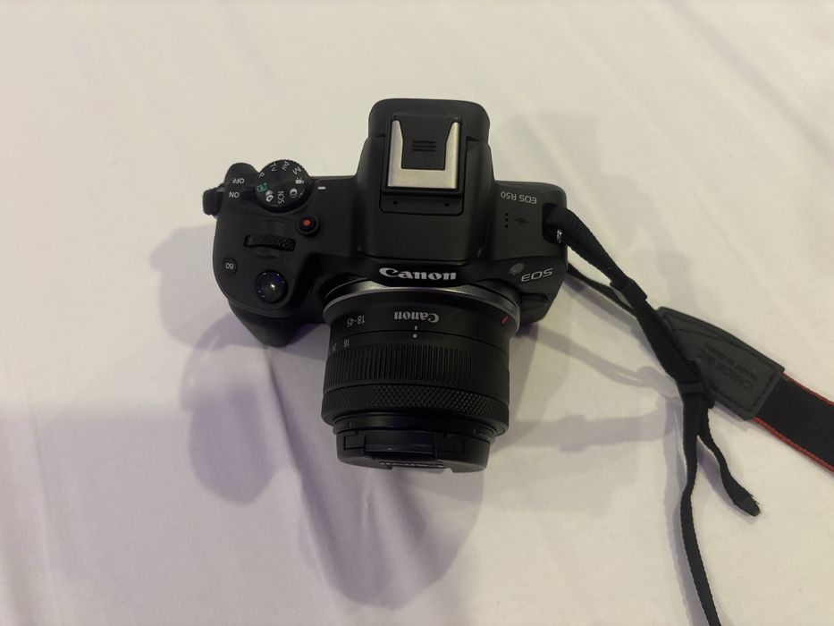 ítulo: Canon EOS R50 como nova + lente 18–45mm – 680€