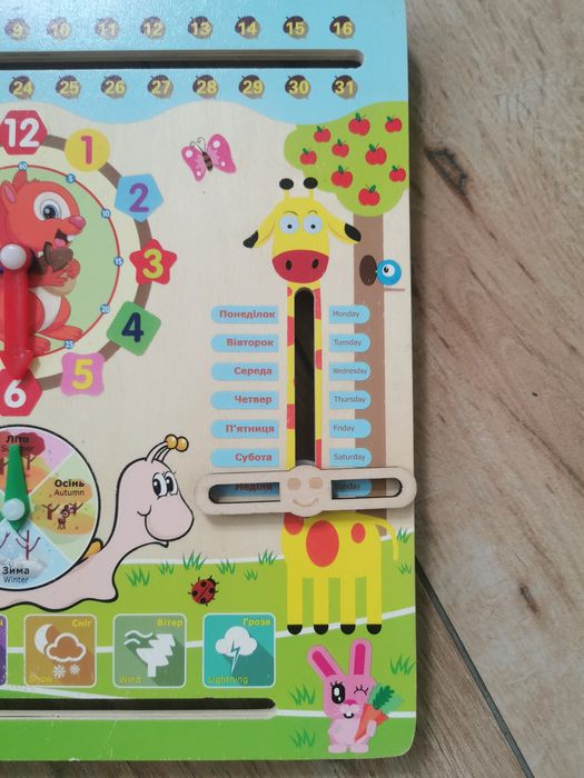 Дерев'яна іграшка для малюків. Розвиваючі годинник і календар природи