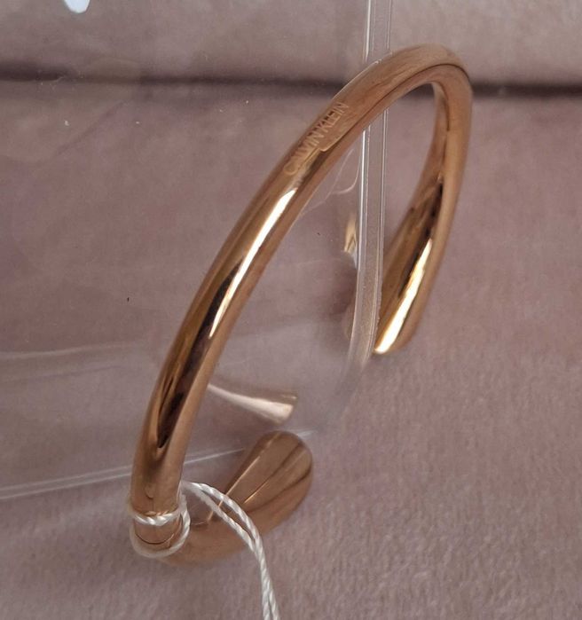 Calvin Klein Bransoletka z błyszczącymi kryształami różowo-złota XS