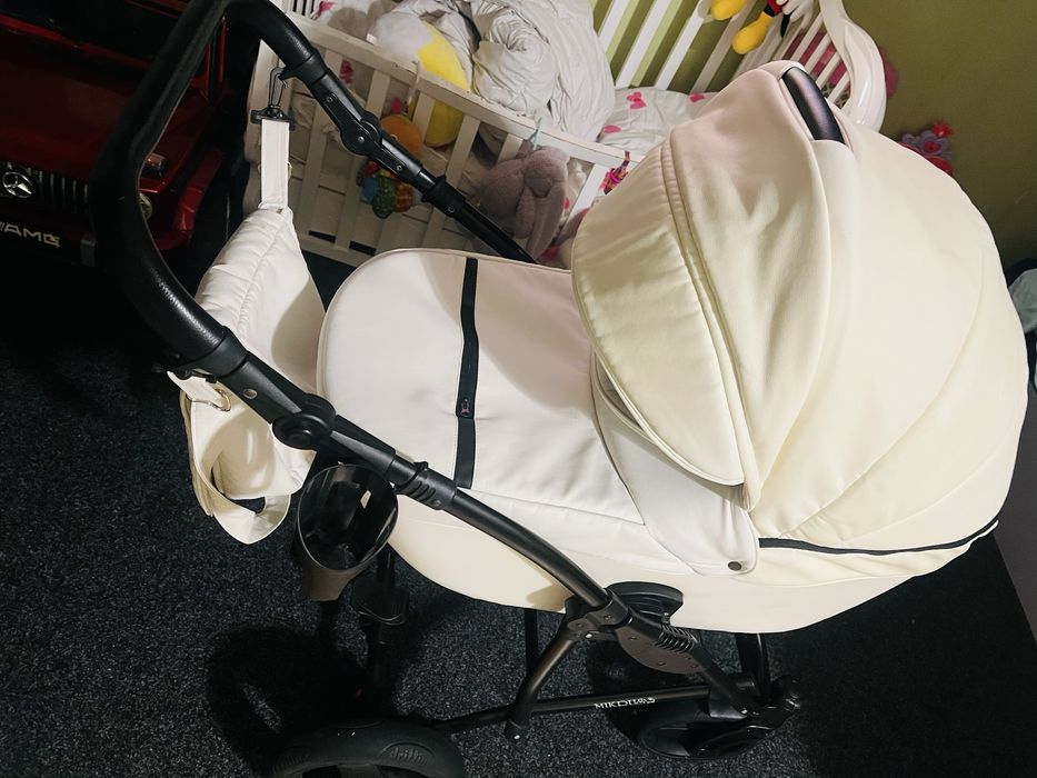 Каляска 2 в 1 біла шкіряна