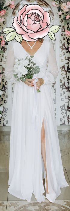 Весільна сукня з розрізом