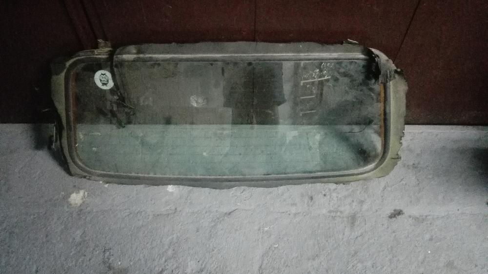 Ford Escort Cabrio szyba tył ramka orginał