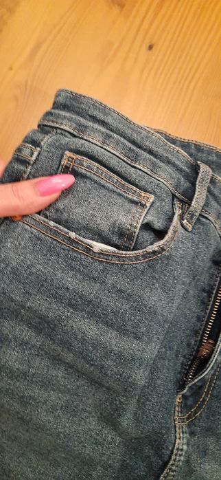 Spodnie jeans M 38